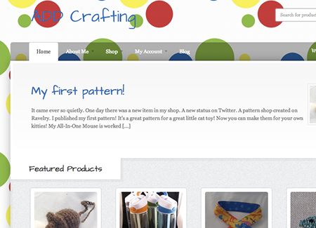 A screenshot of a website with multicolored dots on a white background. The site heading says ADD Crafting. There is a semi-transparent grey menu beneath that. The front page shows a blog snippet titled My first pattern!